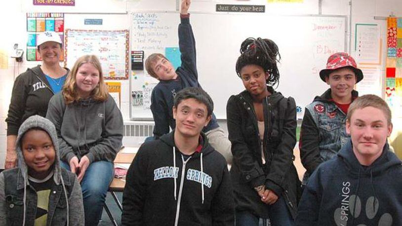 Students in a math class at Yellow Springs High School have launched a small business, YS Spirit Wear, to sell items that promote Bulldog Spirit. Shown above are, front row from left, Kelli Baxter, Josh Lustre and Dyllan VanHoose; back row, teacher Donna Haller, Destiny Jent, Lucas Samsom, Nicole Mayer and Eli Cordell. SUBMITTED