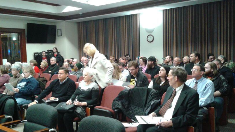 A crowd of mostly professional wrestlers and their fans filled Hamilton’s city council chambers Wednesday and clapped after the Hamilton Planning Commission unanimously approved Friday-evening wrestling events on a 90-day trial basis. MIKE RUTLEDGE/STAFF