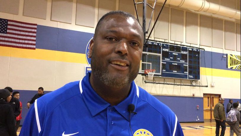 First-year Ponitz High School boys varsity basketball coach Steve Pittman led the Golden Panthers to a 63-45 defeat of visiting Oakwood on Dec. 27, 2016. MARC PENDLETON / STAFF