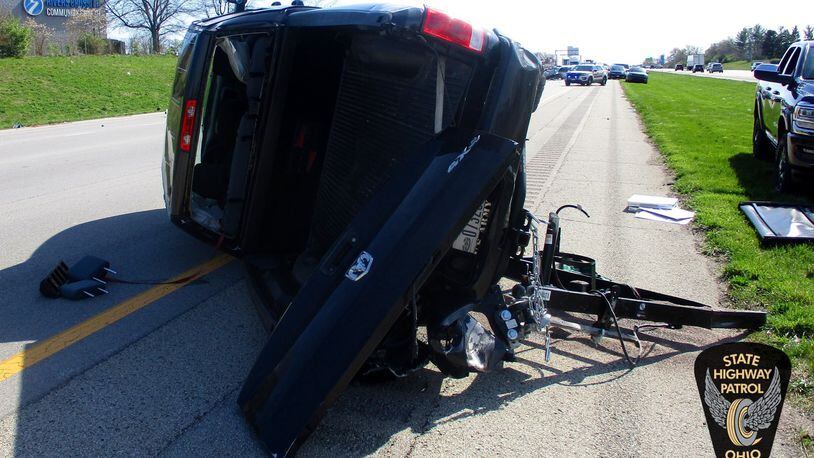 A couple wearing seat belts were not injured when their Dodge Ram towing a trailer was struck and overturned April 22, 2022, on Interstate 71 in Deerfield Twp. CONTRIBUTED