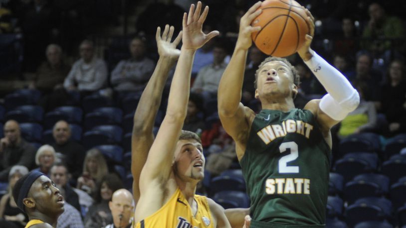 WSU’s Everett Winchester (with ball). Wright State defeated host Toledo 77-69 in a men’s college basketball game on Sat., Dec. 16, 2017. MARC PENDLETON / STAFF