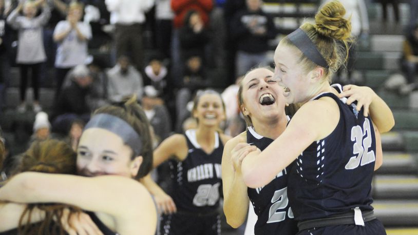 Jayna Black and Aubrey Stupp (right) of Valley View celebrate. Valley View defeated Cincinnati Roger Bacon 69-58 in a D-II girls high school basketball district final at Mason on Friday, March 1, 2019. MARC PENDLETON / STAFF