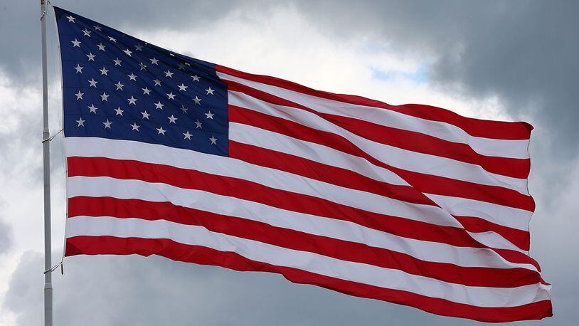 A First Coast High School teacher who allegedly wrote a message on a classroom board reprimanding students who don't stand for the Pledge of Allegiance has been removed from the classroom. (Photo by Tom Pennington/Getty Images)