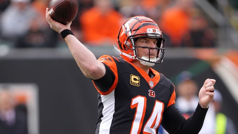 CINCINNATI, OH - NOVEMBER 25: Andy Dalton #14 of the Cincinnati Bengals throws a pass during the first quarter of the game against the Cleveland Browns at Paul Brown Stadium on November 25, 2018 in Cincinnati, Ohio. (Photo by John Grieshop/Getty Images)