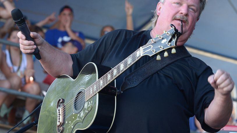 MANHATTAN, KS - JUNE 28:  Singer/Songwriter Joe Diffie performs during "Kicker Country Stampede" at Tuttle Creek State Park on June 28, 2014 in Manhattan, Kansas.  (Photo by Rick Diamond/Getty Images for Neste Event Marketing)