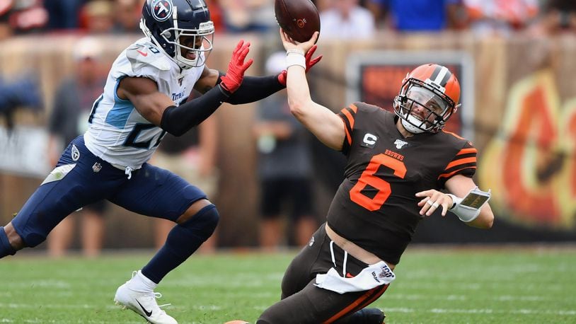 CLEVELAND, OH - SEPTEMBER 08: Quarterback Baker Mayfield #6 of the Cleveland Browns is sacked by Logan Ryan #26 of the Tennessee Titans in the second quarter at FirstEnergy Stadium on September 08, 2019 in Cleveland, Ohio . (Photo by Jamie Sabau/Getty Images)