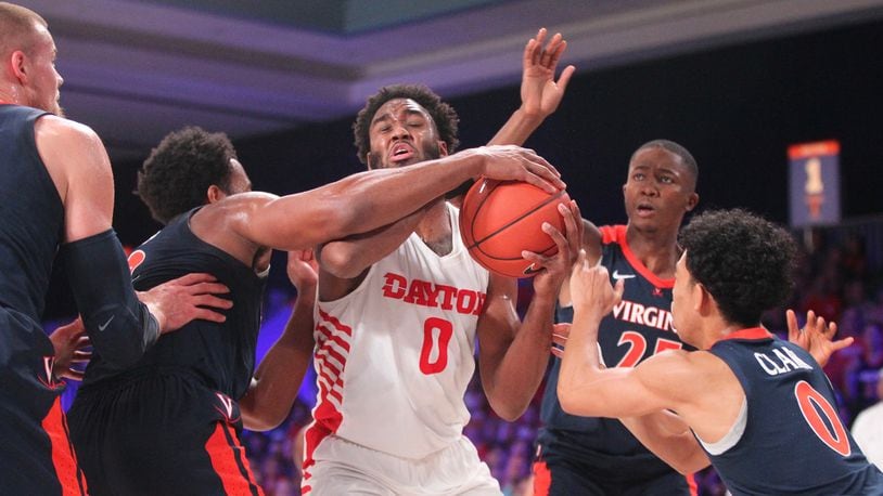 Dayton's Josh Cunningham tries to get off a shot against Virginia in the semifinals of the Battle 4 Atlantis on Thursday, Nov. 22, 2018, at Imperial Gym on Paradise Island, Bahamas.