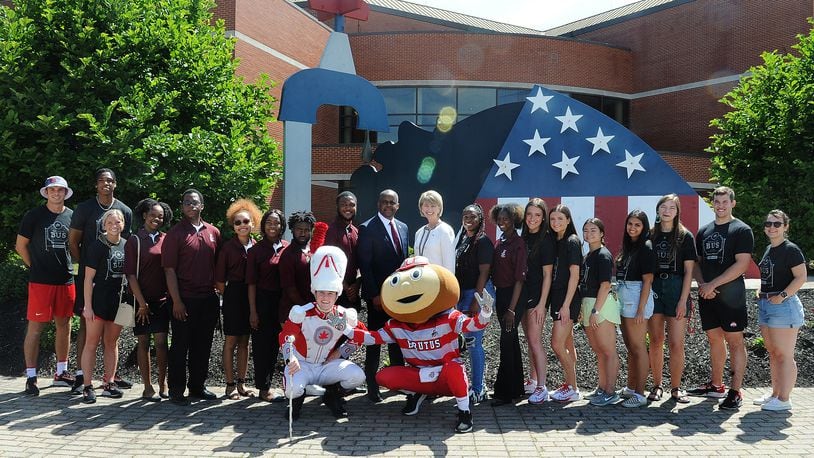 Central State University President, Jack Thomas and the Ohio State University Prsident, Kristina M. Johnson pose with students from both universities in front of the C. J. McLin International Center for Water Resources Management at Central State University, Tuesday June 28, 2022. MARSHALL GORBY\STAFF