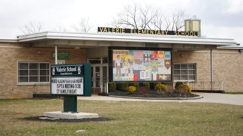 Dayton Public Schools is moving ahead with a plan to close and demolish Valerie Elementary School and move students to Meadowdale Elementary. Some Meadowdale Elementary students would be relocated to other schools to make room. TY GREENLEES / STAFF