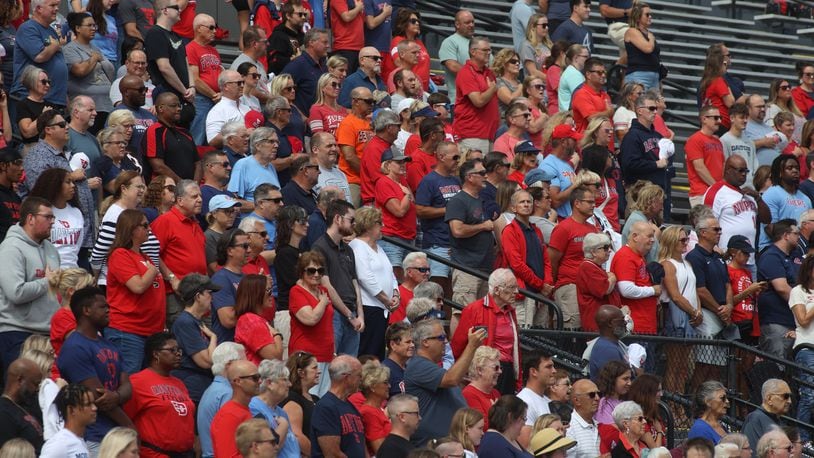Dayton fans stand for the national anthem before a game against Central State on Saturday, Sept. 9, 2023, at Welcome Stadium. David Jablonski/Staff