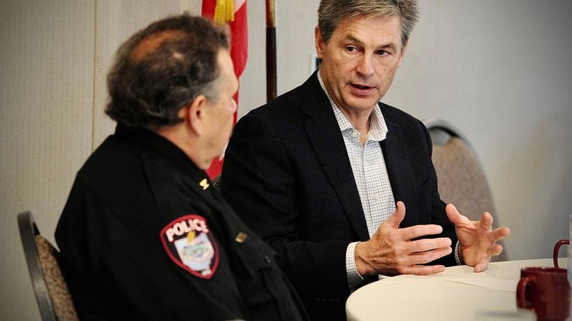 U.S. Senate candidate Matt Dolan, right, held a local law enforcement roundtable at The Golf Club at Yankee Trace, Friday March 25, 2022. Dolan is a Republican state senator from Chagrin Falls. MARSHALL GORBY\STAFF