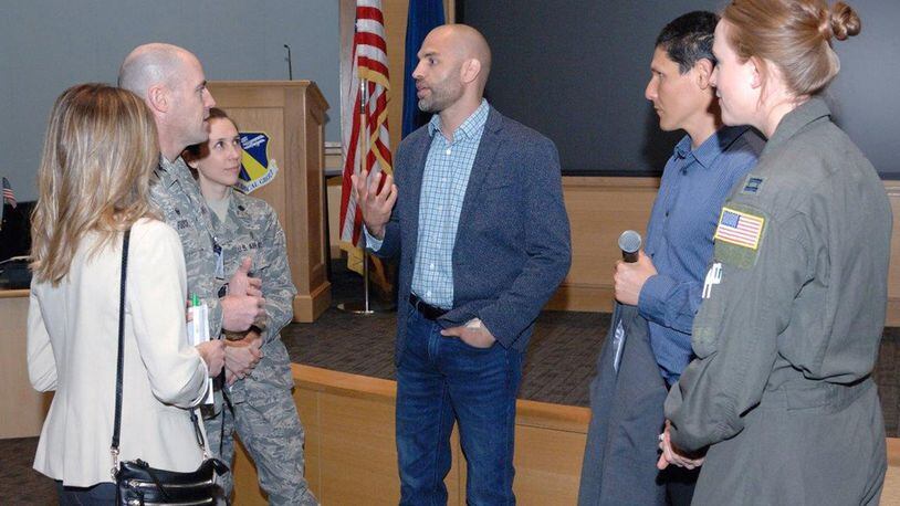 James Wilks (center), producer of “The Game Changers,” speaks to Col. Mike Foutch (left), 88th Medical Group commander, following the film’s screening April 4 at the Wright-Patterson Medical Center. The evidence-based documentary about plant-based eating for performance nutrition and health was shown as a continuing education opportunity for 88 MDG staff members. (Courtesy photo)