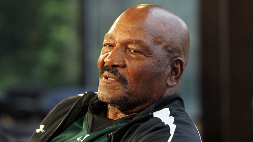 UNIONDALE, NY - JUNE 01: Football legend and new co-owner of the Long Island Lizards Jim Brown conducts an interview before the Major League Lacrosse game against the Ohio Machine on June 1, 2012 at Shuart Stadium in Uniondale, New York. (Photo by Jim McIsaac/Getty Images)