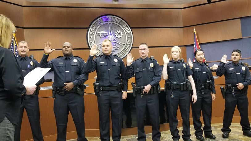 Seven Moraine Police Department patrol officers are sworn in Thursday, Aug. 26, 2021, during council's regularly scheduled meeting. The officers include (left to right)
Tyler Dennis, DaVaughn Richardson, Bryon Watson, Joseph Alexander, Sharmae Hatfield, Karen Arriaga-Perez, and Ali Al Gburi. CONTRIBUTED