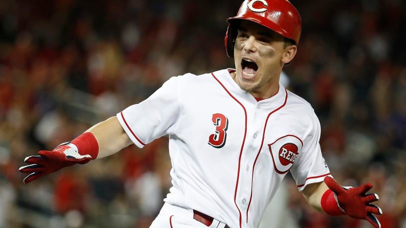 Cincinnati Reds Scooter Gennett (3) celebrates his two-run homer in the ninth inning during the Major League Baseball All-star Game, Tuesday, July 17, 2018 in Washington. (AP Photo/Alex Brandon)