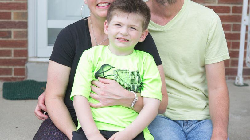 Heather Minton of Beavercreek and her family husband Joe, 47, and son Hunter, 5. CONTRIBUTED