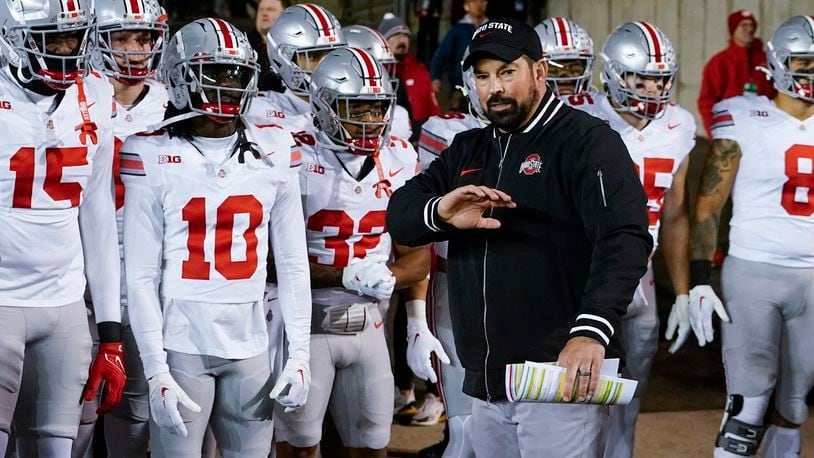 Ohio State head coach Ryan Day leads his team on the field before an NCAA college football game against Wisconsin Saturday, Oct. 28, 2023, in Madison, Wis. (AP Photo/Morry Gash)