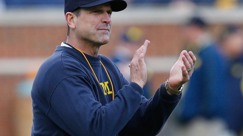 ANN ARBOR, MI - APRIL 01: Head coach Jim Harbaugh of the Michigan Wolverines looks on prior to the Michigan Football Spring Game on April 1, 2016 at Michigan Stadium in Ann Arbor, Michigan.  (Photo by Gregory Shamus/Getty Images)