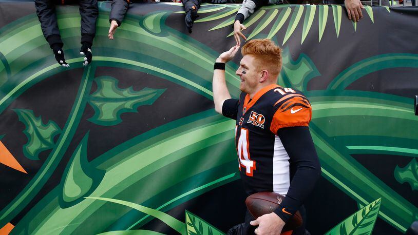 CINCINNATI, OH - OCTOBER 29:  Andy Dalton #14 of the Cincinnati Bengals celebrates with fans after the Bengals 24-23 win over the Indianapolis Colts  at Paul Brown Stadium on October 29, 2017 in Cincinnati, Ohio.  (Photo by Andy Lyons/Getty Images)