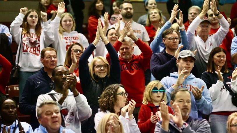 Dayton fans cheer the team after a loss to Houston in the Charleston Classic championship game on Sunday, Nov. 19, 2023, at TD Arena in Charleston, S.C. David Jablonski/Staff