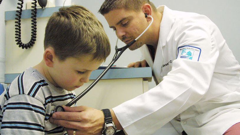File photo of a doctor examining a child.