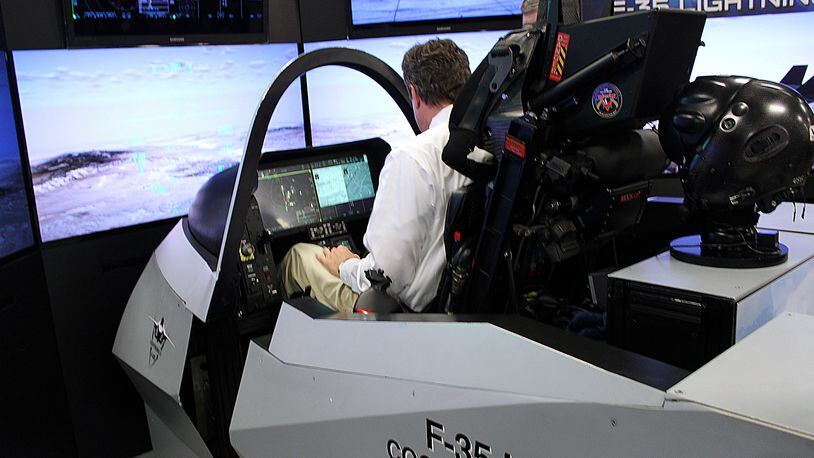 ETI Tech of Englewood demonstrated an F-35 interactive cockpit for U.S. Rep. Mike Turner, R-Dayton, in this 2013 photo. FILE