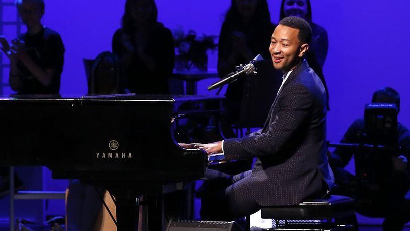 John Legend performs on stage during a concert following the ribbon cutting for the new John Legend Theater in Springfield in October 2016. Bill Lackey/Staff