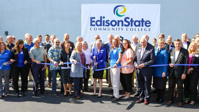 Edison State President Dr. Doreen Larson, along with supporters of Edison State, cut the ribbon to the newest Edison State campus located in Troy.