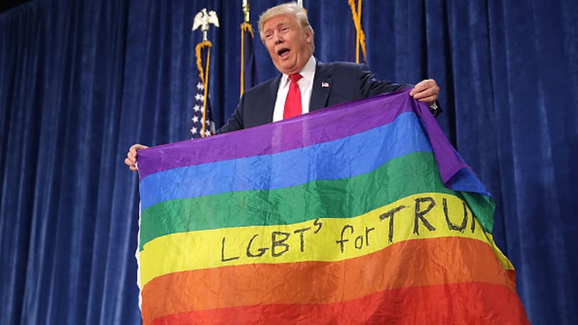 GREELEY, CO - OCTOBER 30:  Republican presidential nominee Donald Trump holds a rainbow flag given to him by supporter Max Nowak during a campaign rally at the Bank of Colorado Arena on the campus of University of Northern Colorado October 30, 2016 in Greeley, Colorado. With less than nine days until Americans go to the polls, Trump is campaigning in Nevada, New Mexico and Colorado.  (Photo by Chip Somodevilla/Getty Images)