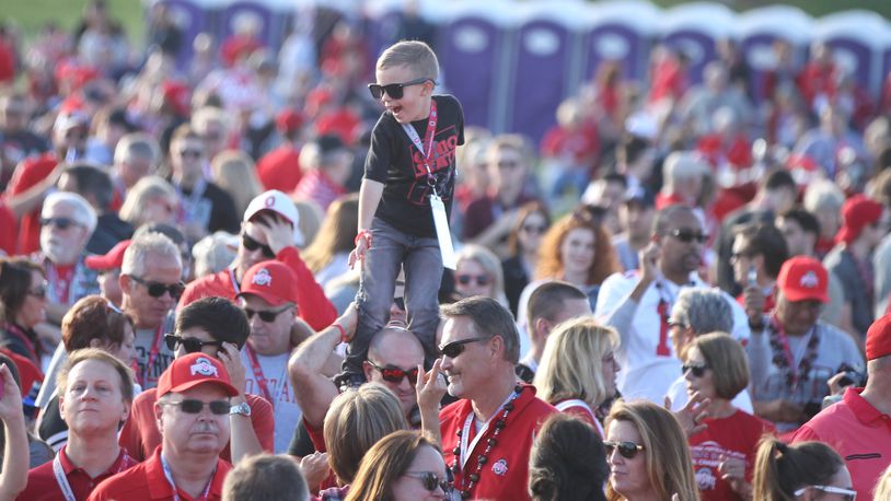 A young fan gets a better view at the Buckeye Bash on Friday. David Jablonski/Staff