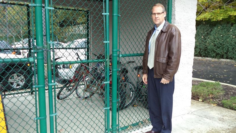 Oakwood City Manager Norbert Klopsch with abandoned bicycles in Oakwood. FILE PHOTO