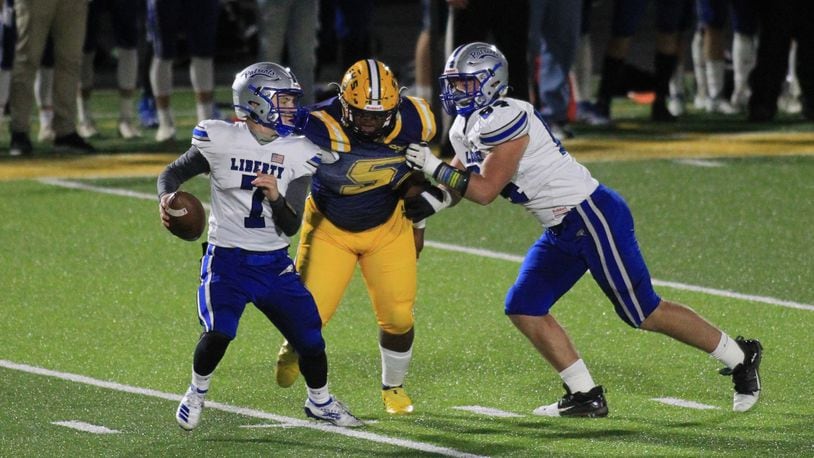 Springfield's Jokell Brown records a sack against Olentangy Liberty on Friday, Oct. 30, 2020, at Springfield. David Jablonski/Staff
