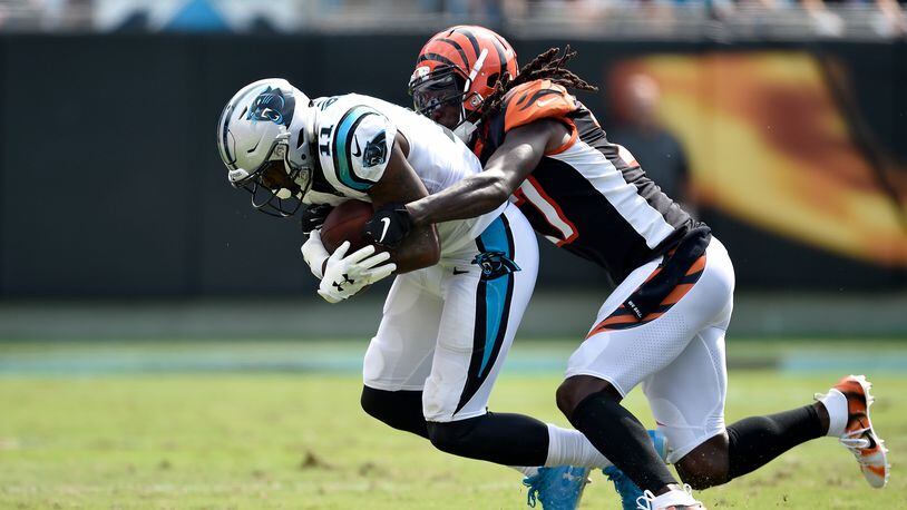 Torrey Smith #11 of the Carolina Panthers runs the ball against Dre Kirkpatrick #27 of the Cincinnati Bengals in the first quarter during their game at Bank of America Stadium on September 23, 2018 in Charlotte, North Carolina. (Photo by Grant Halverson/Getty Images)