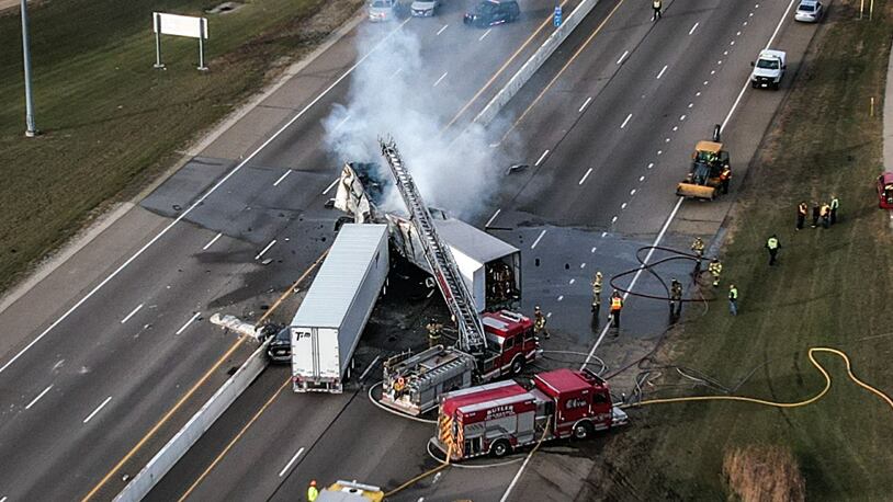 A fiery crash involving two semis and two cars shut down both directions of Interstate 75 near I-70 on Friday afternoon, Dec. 2, 2022. JIM NOELKER/STAFF