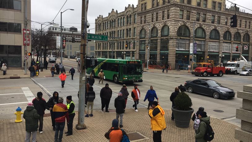 The downtown Dayton RTA hub was closed and passengers were loading and unloading buses at the intersection of Main and Third streets while the bomb squad investigated and detonated a suspicious package on Nov. 26. STAFF PHOTO