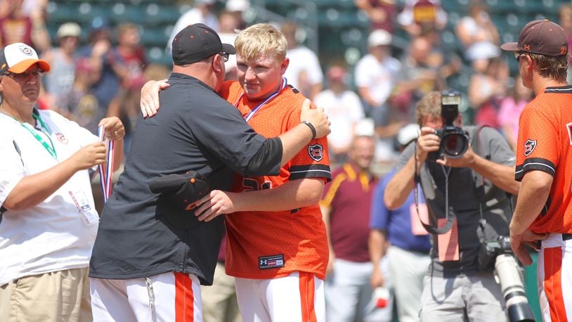 Coldwater receives state runner-up medals after a loss to South Range in the Division III state championship game on Saturday, June 2, 208, at Huntington Park in Columbus.