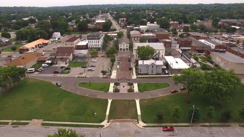 The splash pad to be installed at Miamisburg’s Riverfront Park will be constructed in the square grassy area in the lower center area of this photo. TY GREENLEES / STAFF