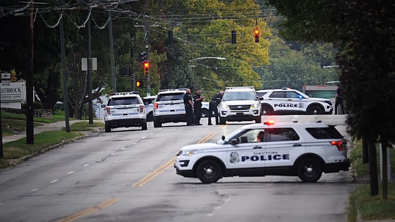 A man is in critical condition after he was shot by police on Wayne Avenue in Dayton on Thursday, Sept. 24, 2020. STAFF PHOTO / MARSHALL GORBY