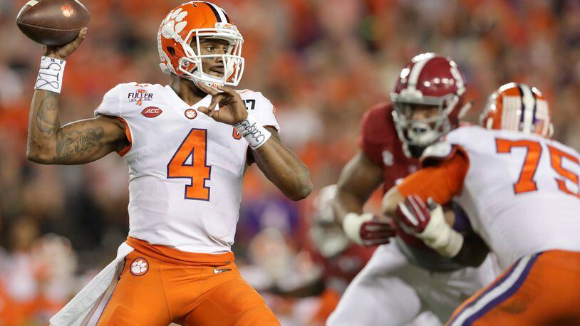 TAMPA, FL - JANUARY 09: Quarterback Deshaun Watson #4 of the Clemson Tigers throws a pass during the first half against the Alabama Crimson Tide in the 2017 College Football Playoff National Championship Game at Raymond James Stadium on January 9, 2017 in Tampa, Florida. (Photo by Streeter Lecka/Getty Images)