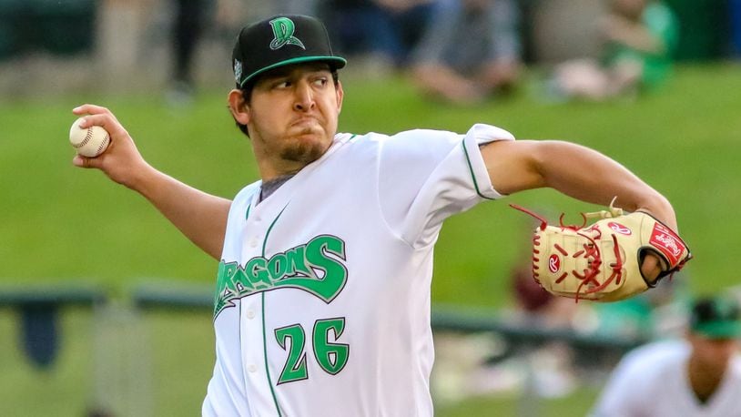 Dayton Dragons pitcher Ricky Salinas throws a pitch during their game against the Lansing Lugnuts at Fifth Third Field on Wednesday night at Fifth Third Field. The Dragons lost 3-1. CONTRIBUTED PHOTO BY MICHAEL COOPER