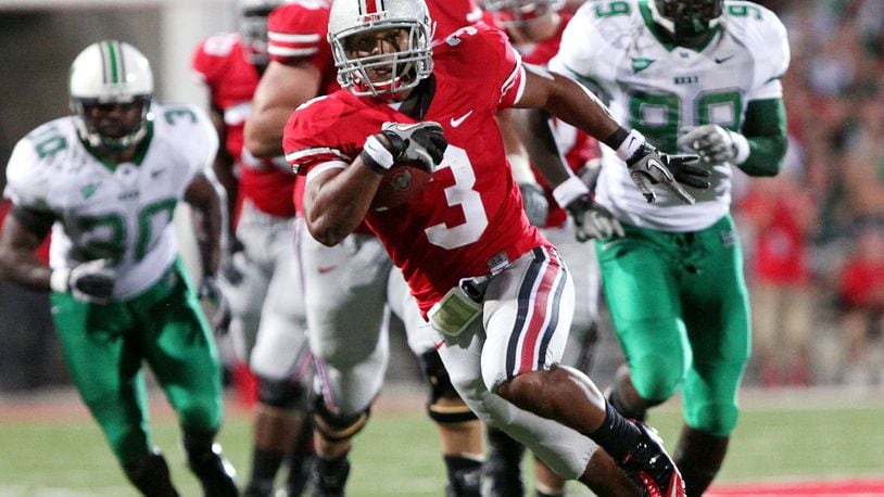 Ohio State running back Brandon Saine (3) runs in for a touchdown during the first half of an NCAA college football game against Marshall, Thursday, Sept 2, 2010, in Columbus, Ohio. (AP Photo/Terry Gilliam)