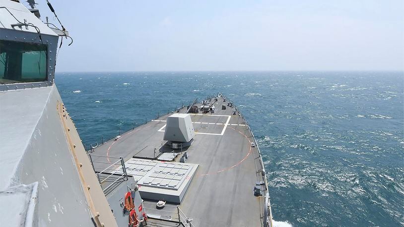 In this photo provided by the U.S. Navy, the Arleigh Burke-class guided-missile destroyer USS Halsey (DDG 97) conducts routine underway operations while transiting through the Taiwan Strait Wednesday, May 8, 2024. (Mass Communication Specialist 3rd class Ismael Martinez/U.S. Navy via AP)