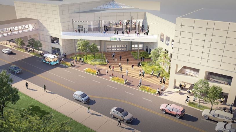 A conceptual rendering of a renovated Dayton Convention Center. The facility will have a terrace, green space and its signature metal structure out front will be removed. CONTRIBUTED