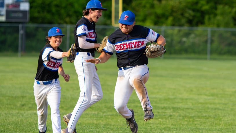 Right to left, Greeneview first baseman Jarrod Mays, shortstop Kaden Knisley and second baseman Grant Gallagher celebrate the final out of Monday's 1-0 tournament win over Preble Shawnee. Jeff Gilbert/CONTRIBUTED