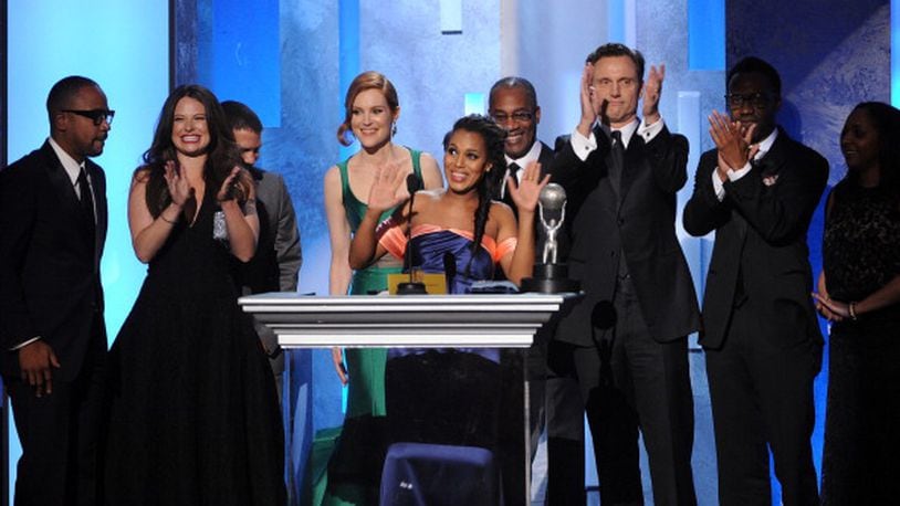 PASADENA, CA - FEBRUARY 22:  The cast of "Scandal" accept the Outstanding Drama Series award onstage during the 45th NAACP Image Awards presented by TV One at Pasadena Civic Auditorium on February 22, 2014 in Pasadena, California.  (Photo by Kevin Winter/Getty Images for NAACP Image Awards)