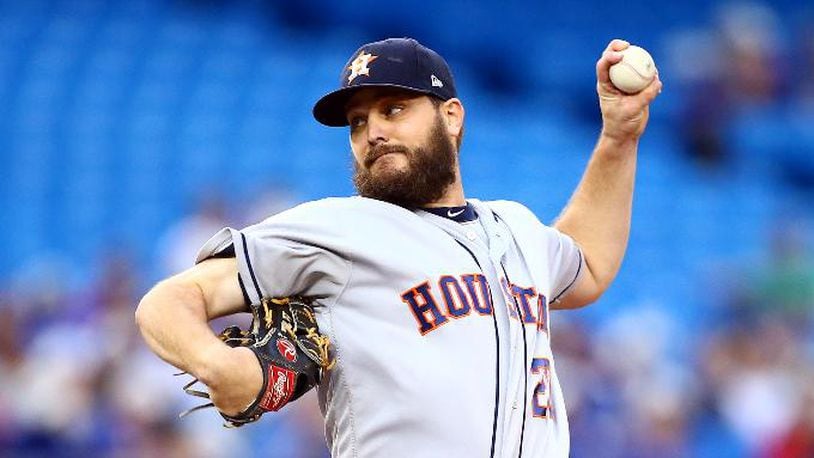 TORONTO, ON - AUGUST 30:  Wade Miley #20 of the Houston Astros delivers a pitch in the first inning during a MLB game against the Toronto Blue Jays at Rogers Centre on August 30, 2019 in Toronto, Canada.  (Photo by Vaughn Ridley/Getty Images)