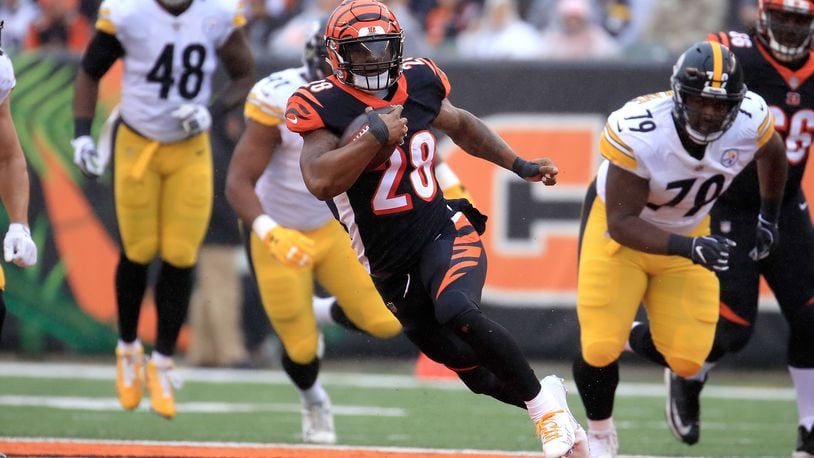 CINCINNATI, OH - OCTOBER 14: #28 of the Cincinnati Bengals runs with the ball against the Pittsburgh Steelers at Paul Brown Stadium on October 14, 2018 in Cincinnati, Ohio. (Photo by Andy Lyons/Getty Images)