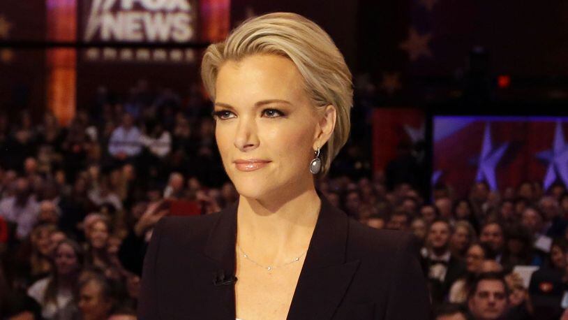 In this Jan. 28, 2016, photo, moderator Megyn Kelly waits for the start of the Republican presidential primary debate in Des Moines, Iowa.