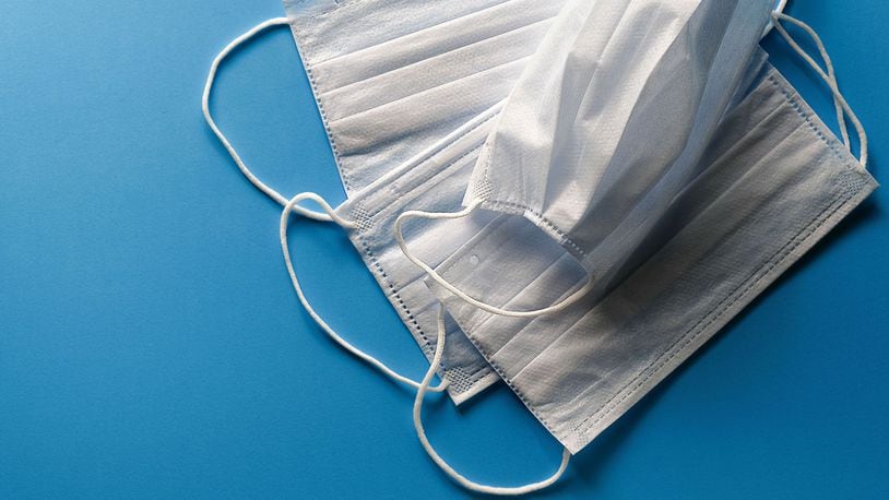 Disposable face masks are pictured. The CDC has recommended that U.S. residents use cloth face coverings in public settings to help prevent the spread of COVID-19.