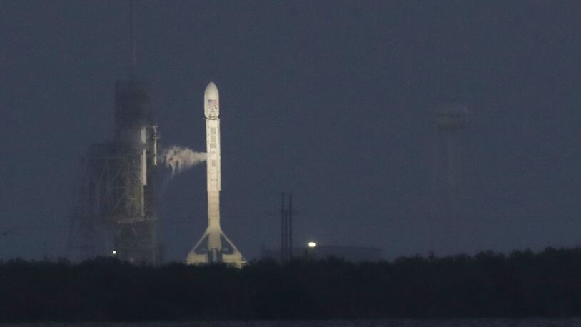 CAPE CANAVERAL, FL - APRIL 30:   SpaceX Falcon 9 rocket sits on launch pad 39A just before its scheduled morning launch was cancelled due to a technical issue on April 30, 2017 in Cape Canaveral, Florida.   SpaceX is attempting to deliver a classified payload to orbit and liftoff is has been rescheduled for tomorrow from Kennedy Space Center.  (Photo by Joe Raedle/Getty Images)